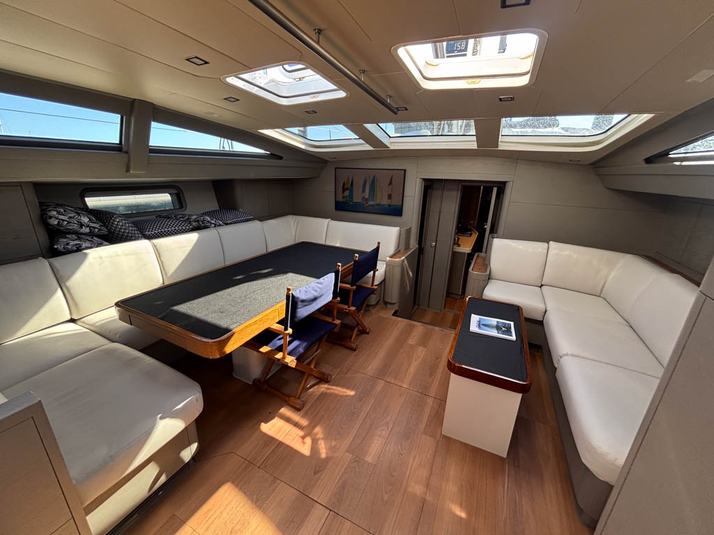 Main living area and saloon interior of Swan 82 yacht Crackerjack V designed by Lazzarini Pickering.